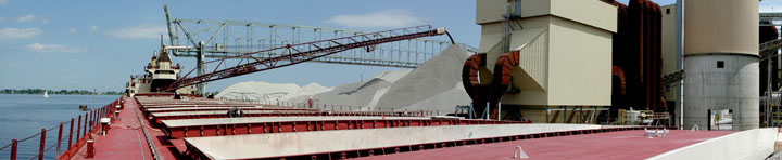 Banner image: Courtney Burton unloading limestone in Superior
