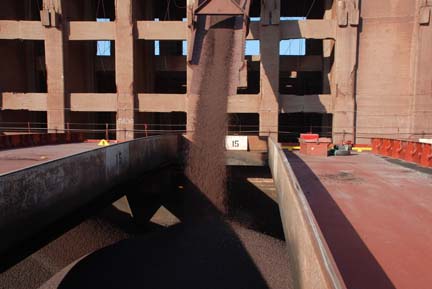 Ore chute over hatch opening