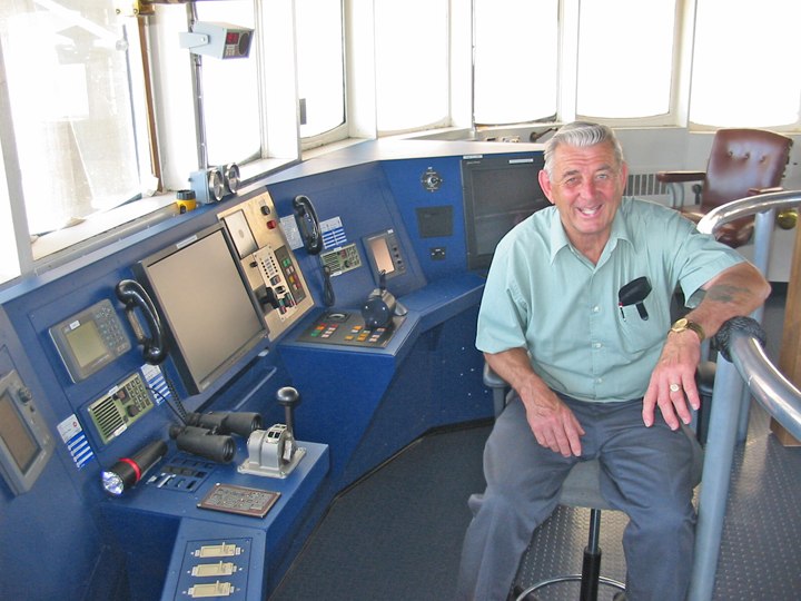 Captain Bartlett in pilothouse