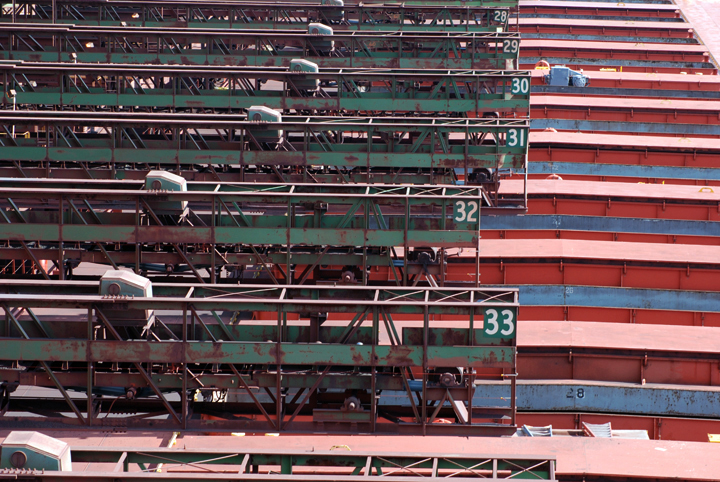 Conveyor shuttles over the deck