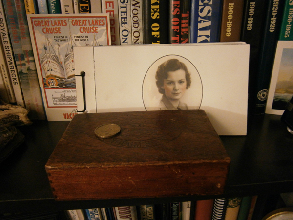 this old wooden Yokum Brothers Cuban Cigar Facotry cigar box is home to a handful of rocks, old pennies and driftwood