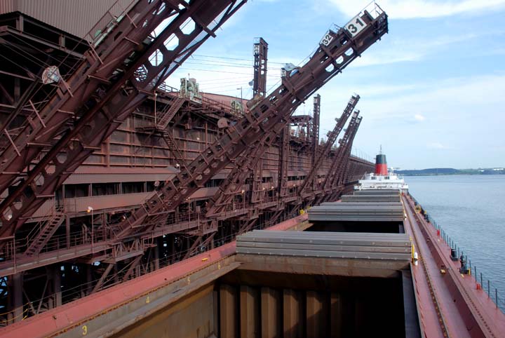 Conveyor shuttles being lowered
